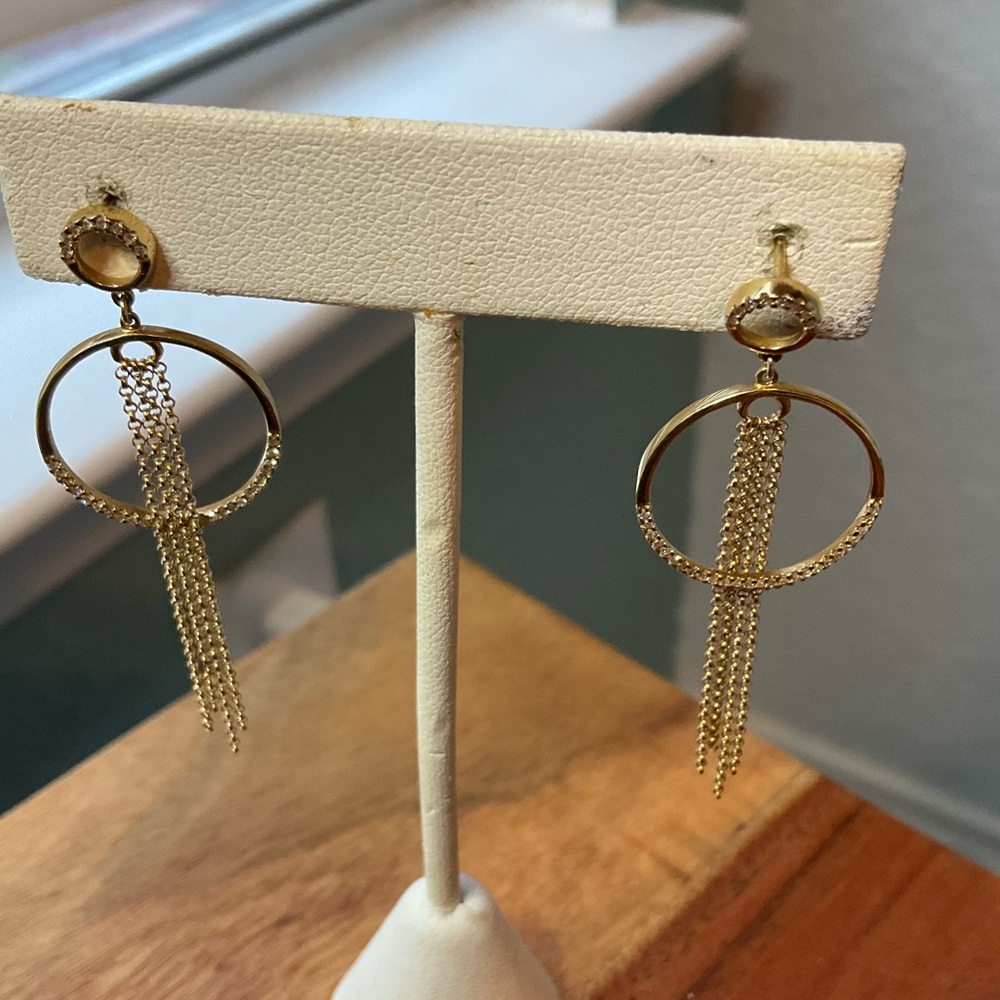 Chain Dangle 14K yellow gold Diamond earrings.